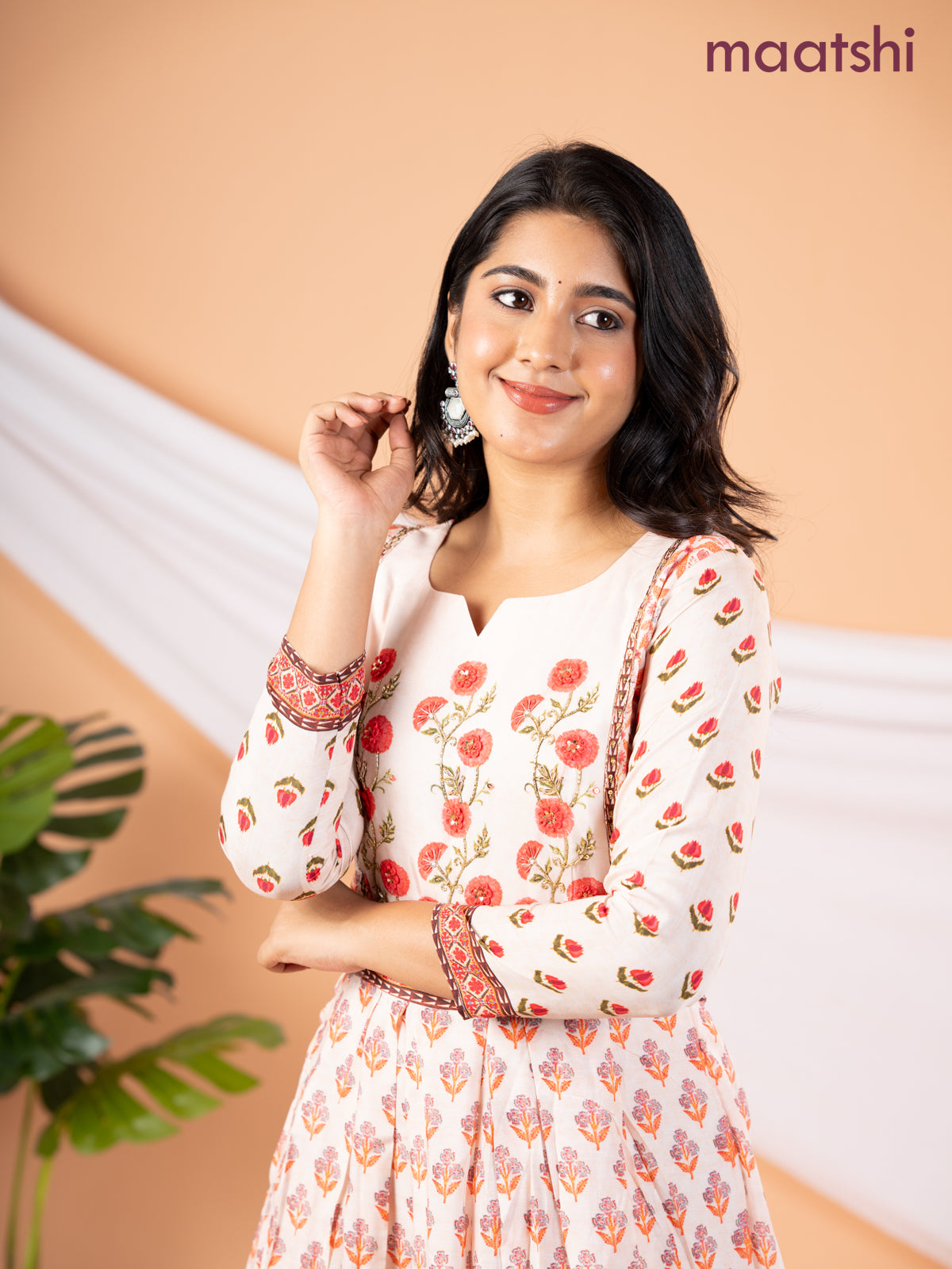 Pure muslin floor length dress peach shade with allover prints & embroidery neck pattern without pant