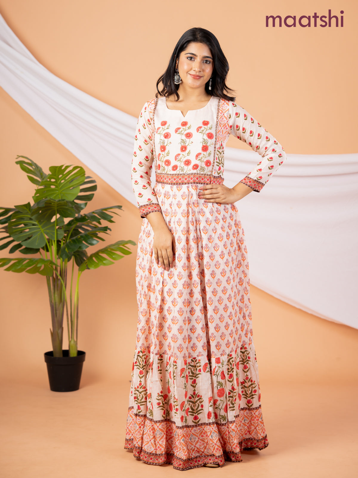 Pure muslin floor length dress peach shade with allover prints & embroidery neck pattern without pant