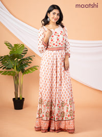 Pure muslin floor length dress peach shade with allover prints & embroidery neck pattern without pant