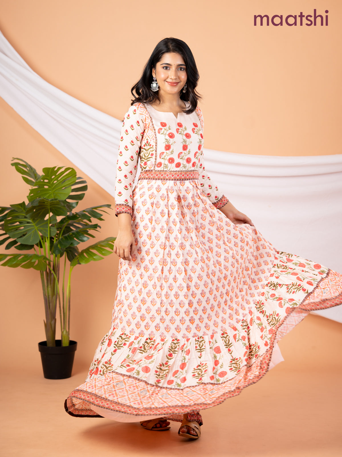 Pure muslin floor length dress peach shade with allover prints & embroidery neck pattern without pant