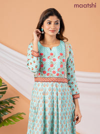 Pure muslin floor length dress teal green with allover prints & embroidery neck pattern without pant