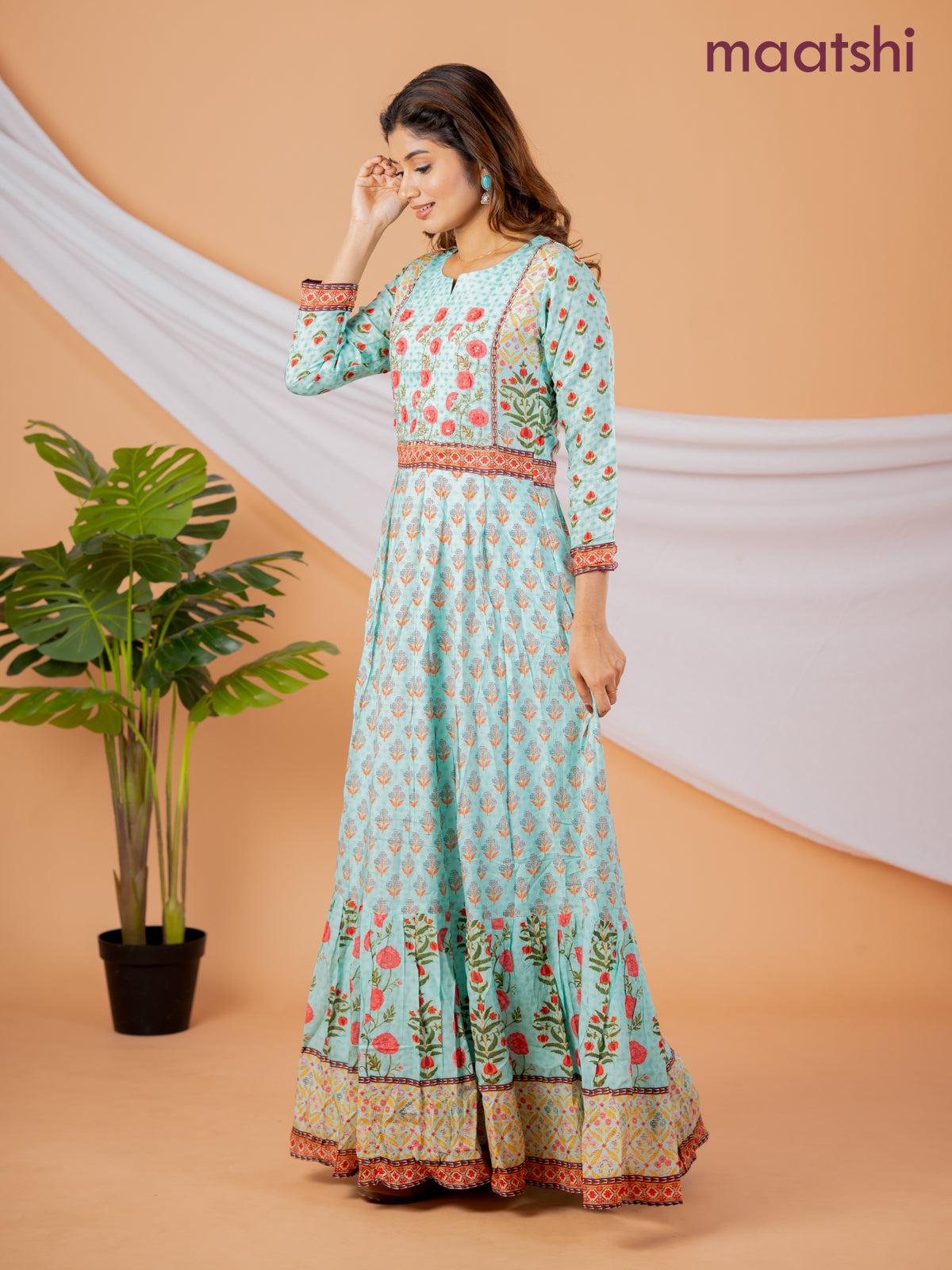 Pure muslin floor length dress teal green with allover prints & embroidery neck pattern without pant