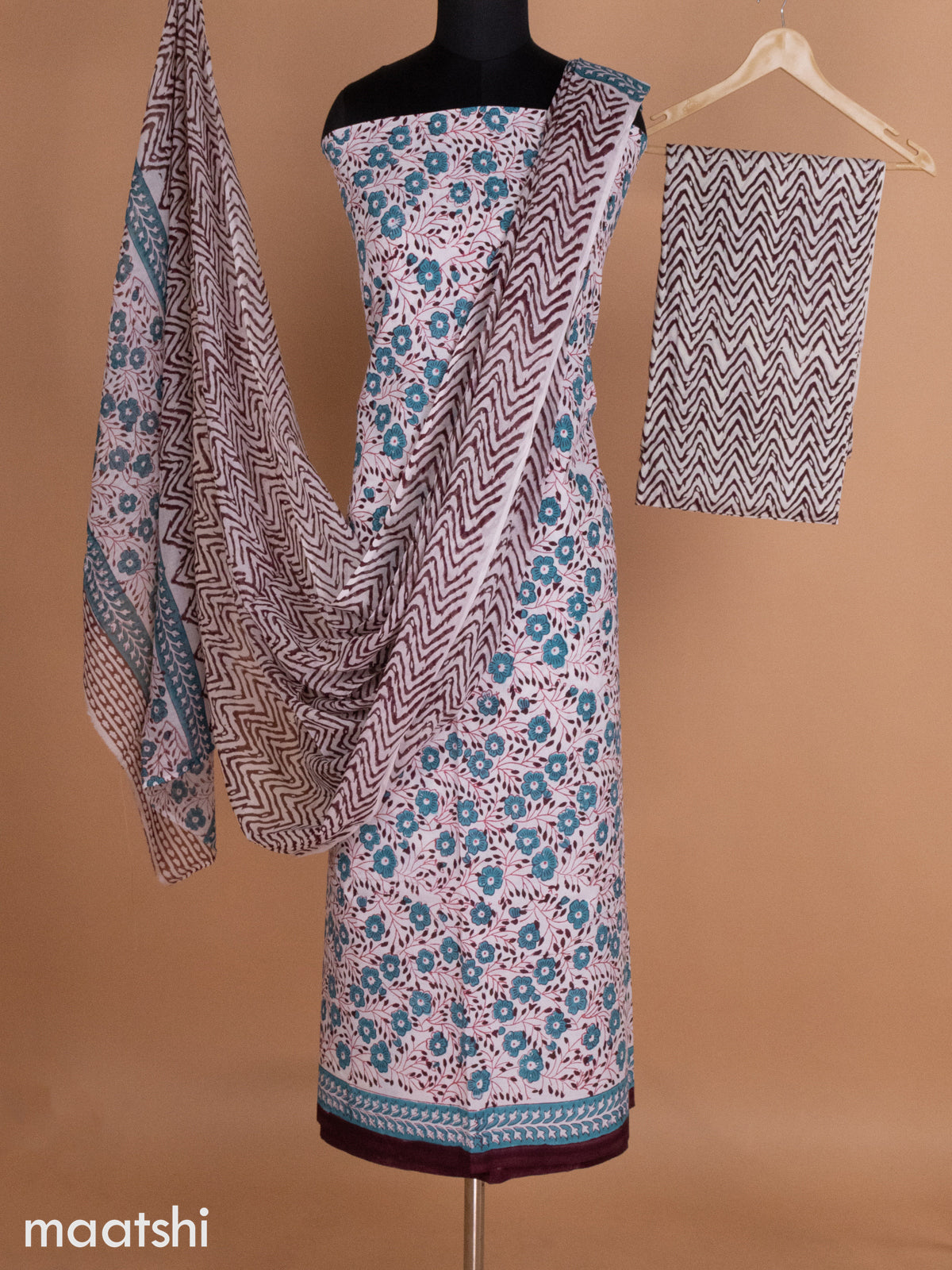 Off White and Teal Blue Brown Mulmul Cotton Dress Material With Allover Floral Prints and Bottom & Cotton Dupatta