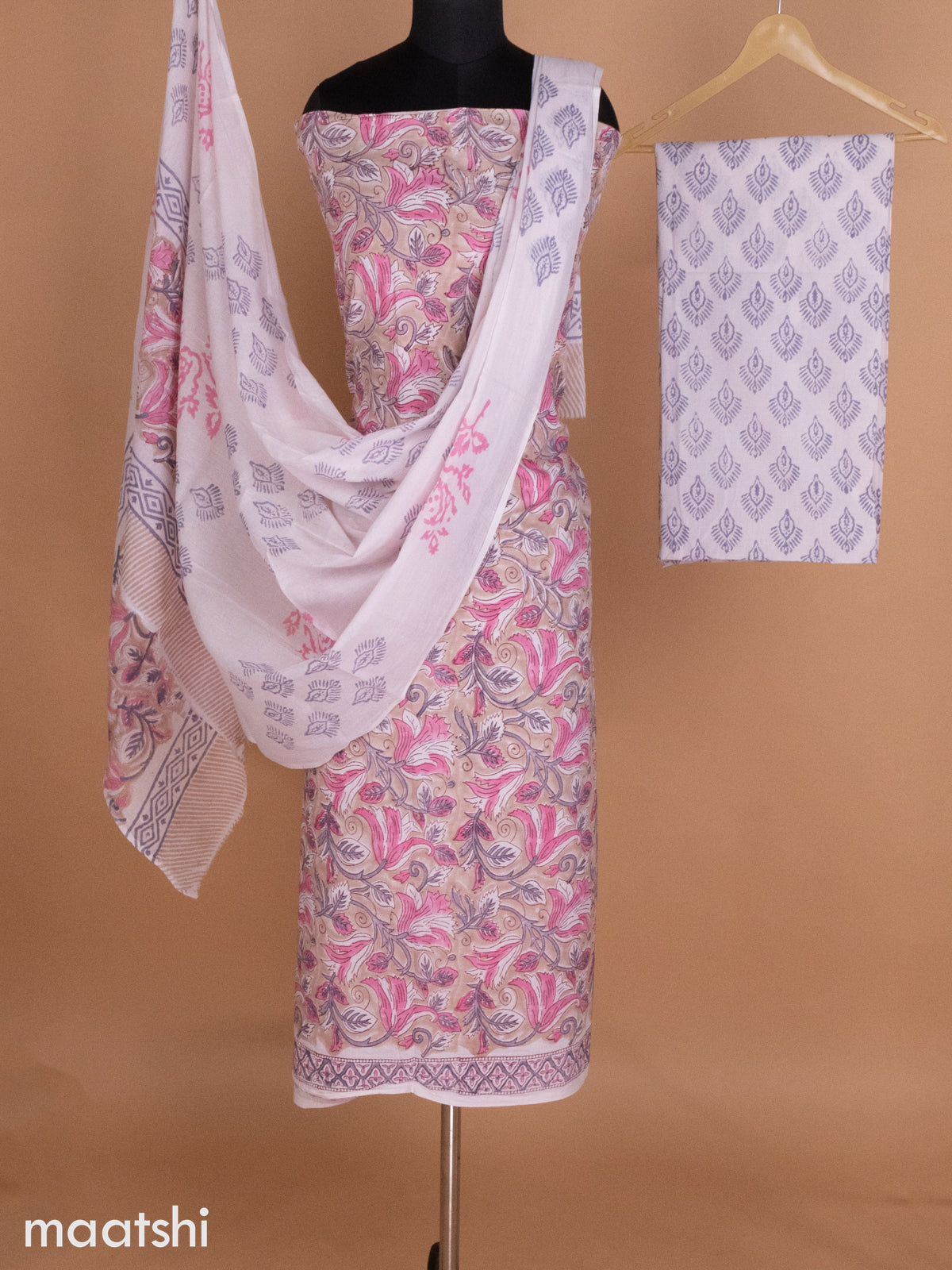 Pastel Brown Shade and Off White Mulmul Cotton Dress Material With Allover Floral Prints and Bottom & Cotton Dupatta