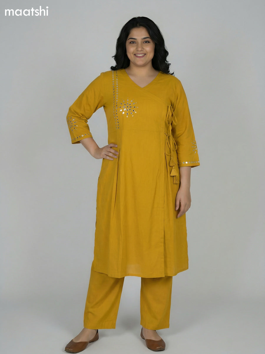 Mustard Shade Cotton Mirror Work With Angrakha Pattern A-Line Suit