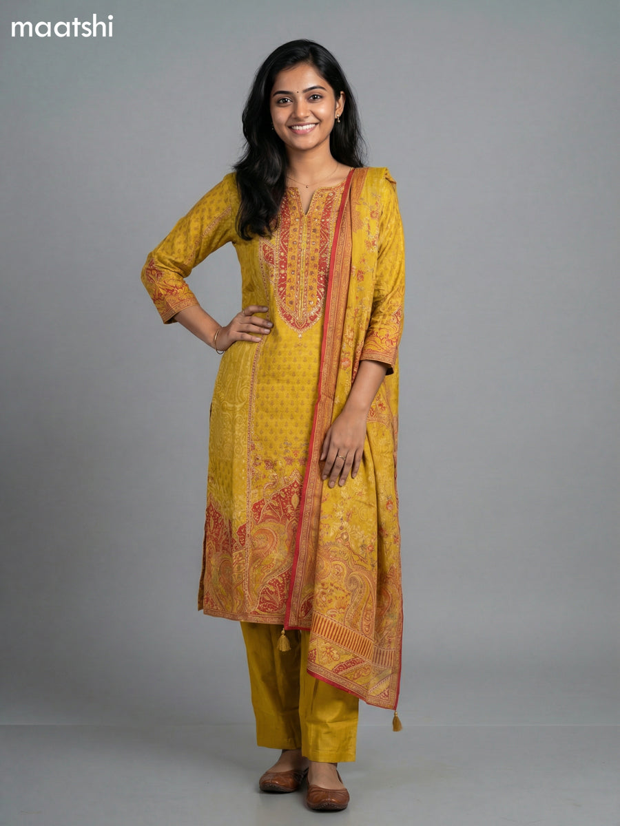 Mustard Yellow Muslin Printed & Embroidery Work Straight Suit