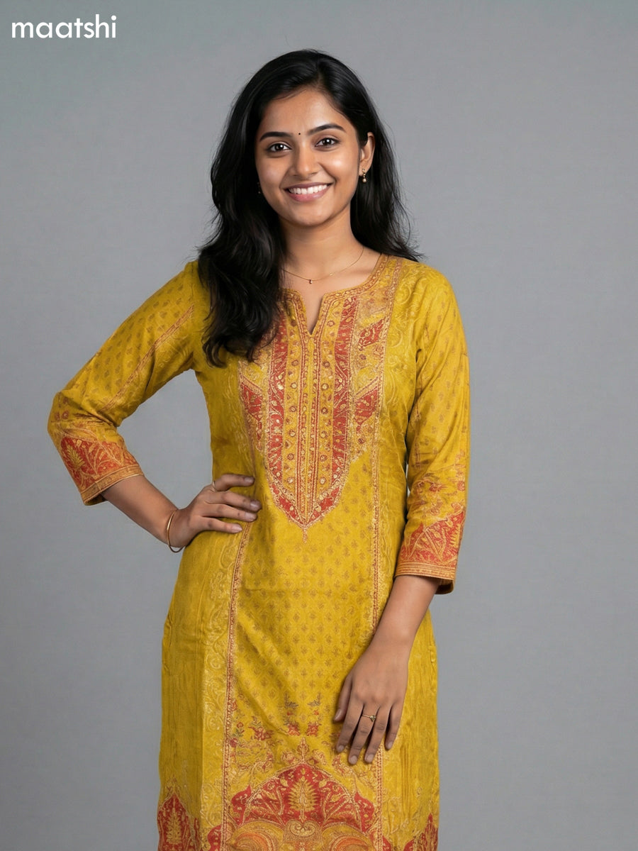 Mustard Yellow Muslin Printed & Embroidery Work Straight Suit