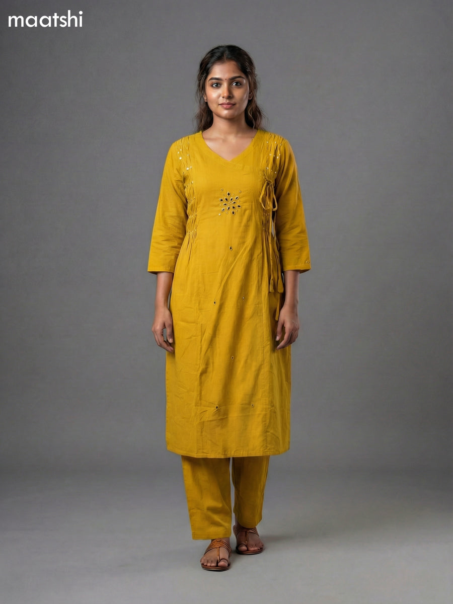 Mustard Shade Cotton Mirror Work With Angrakha Pattern A-Line Suit