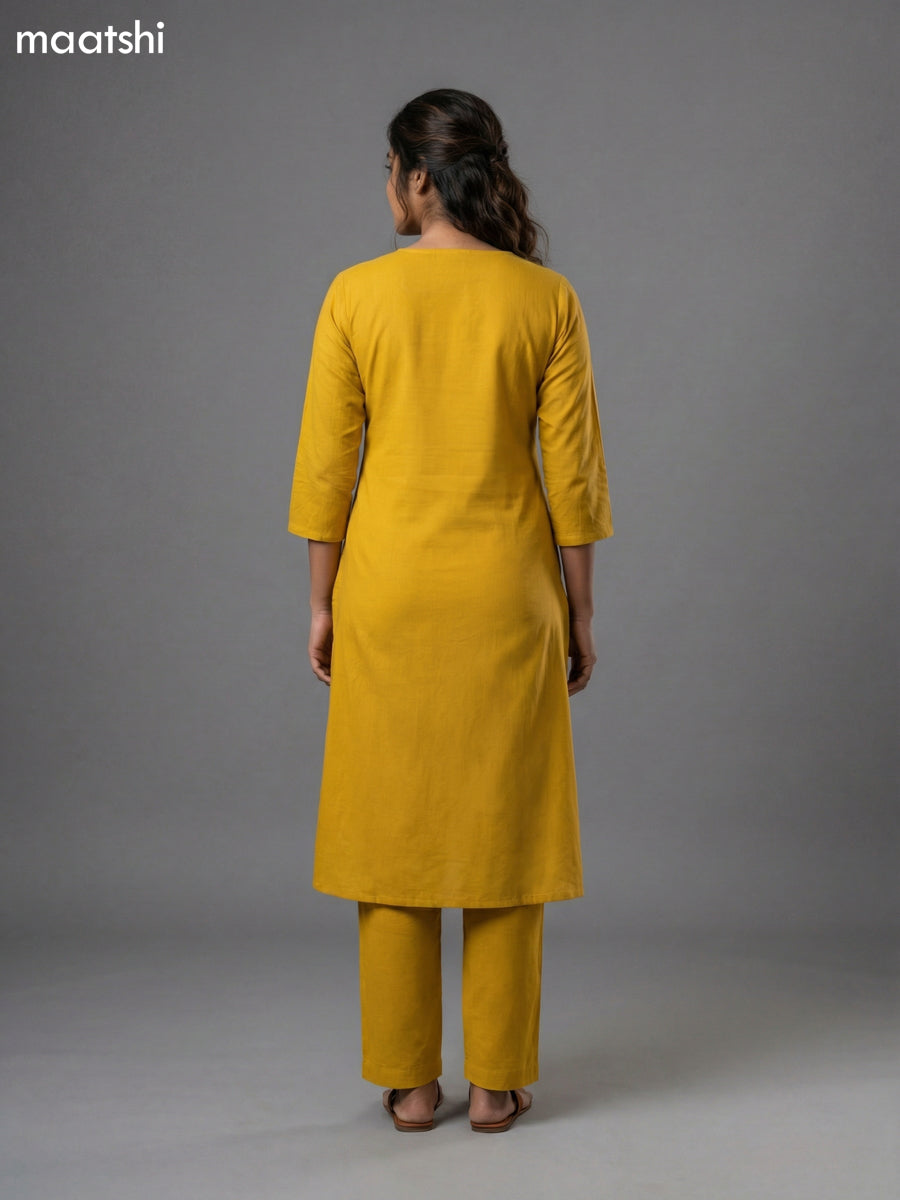 Mustard Shade Cotton Mirror Work With Angrakha Pattern A-Line Suit