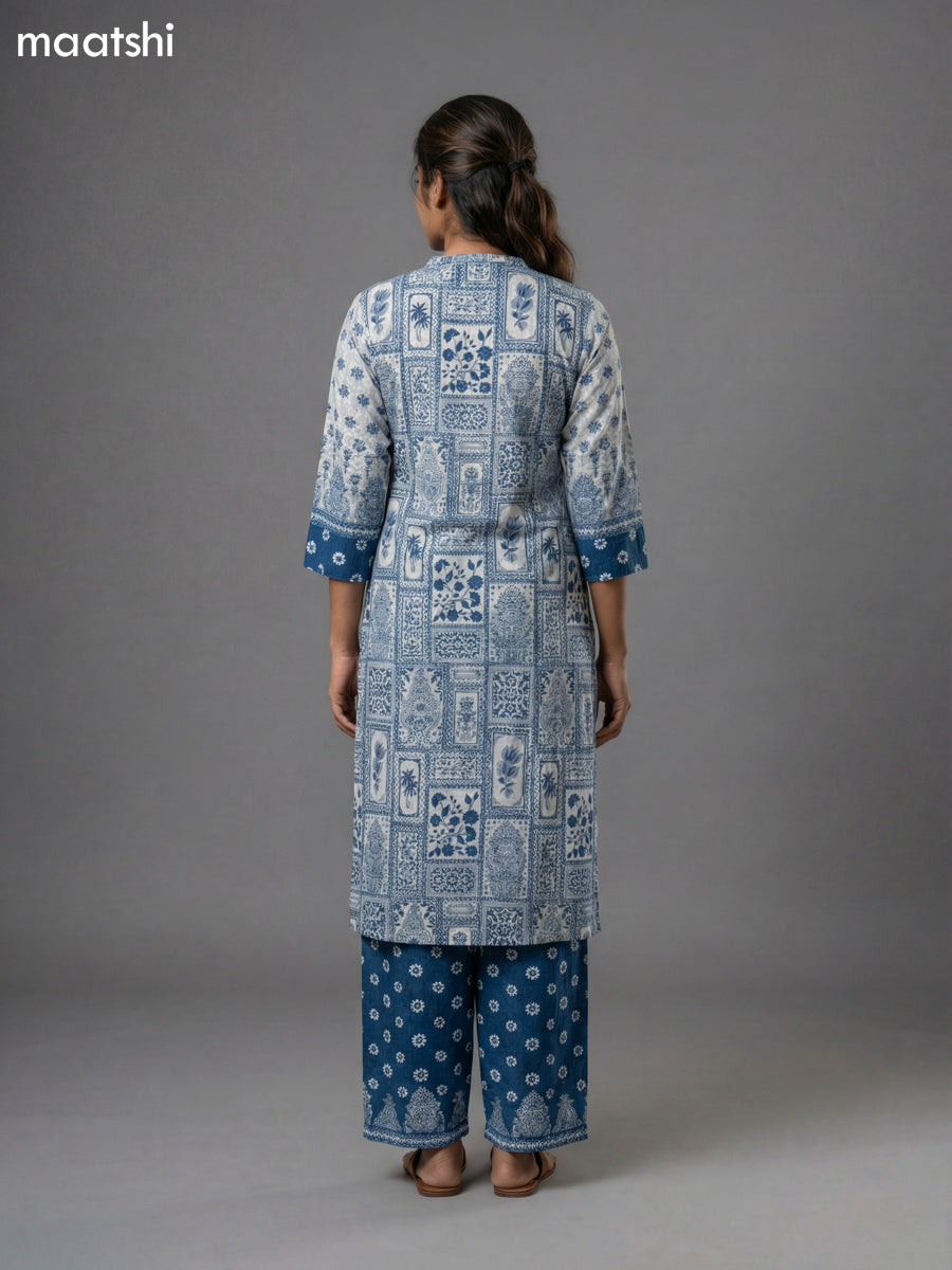 Off White and Blue Muslin Printed Straight Suit