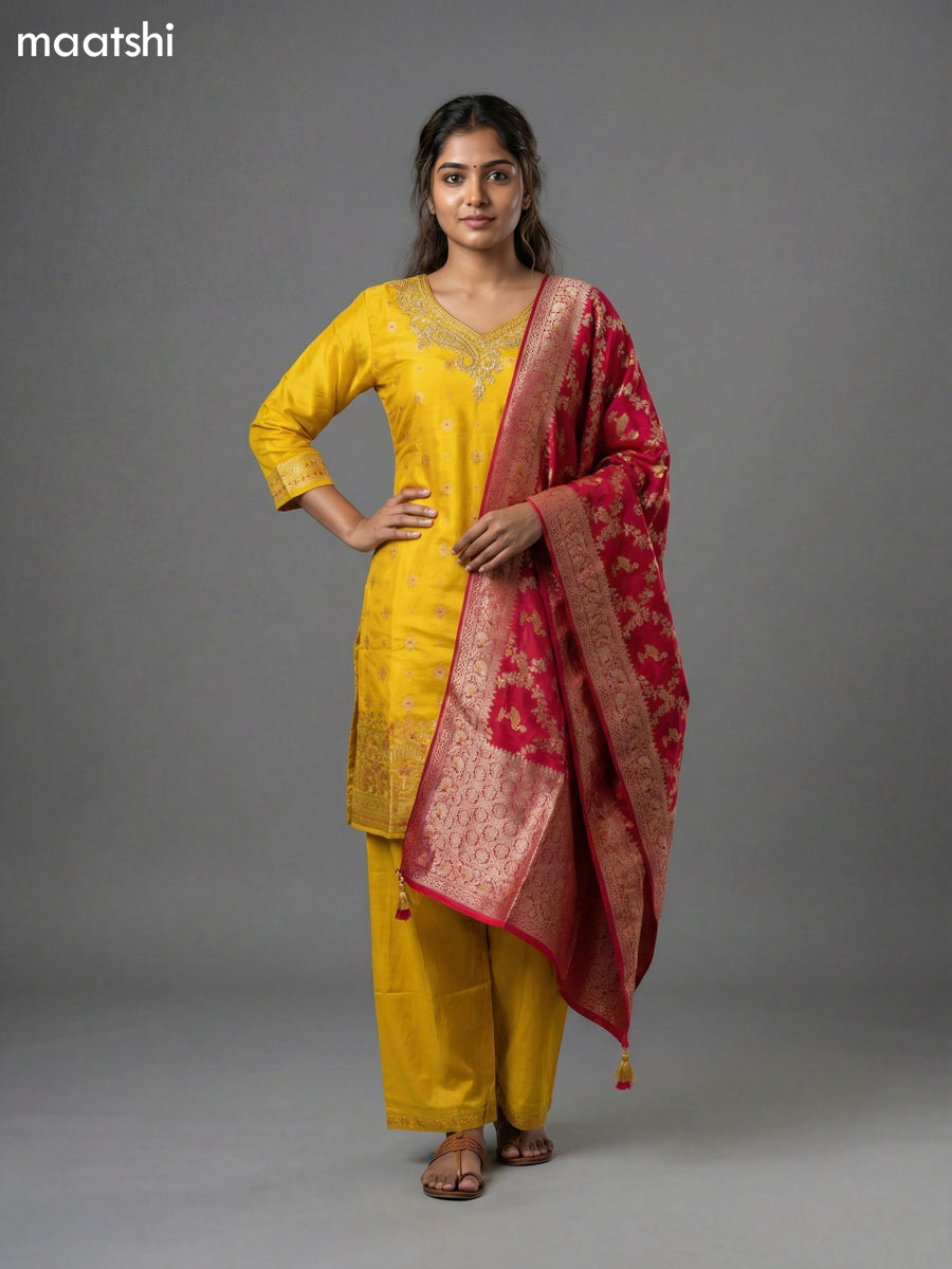 Yellow and Pink Art Tussar Zari Buttas & Sequin Work Straight Suit