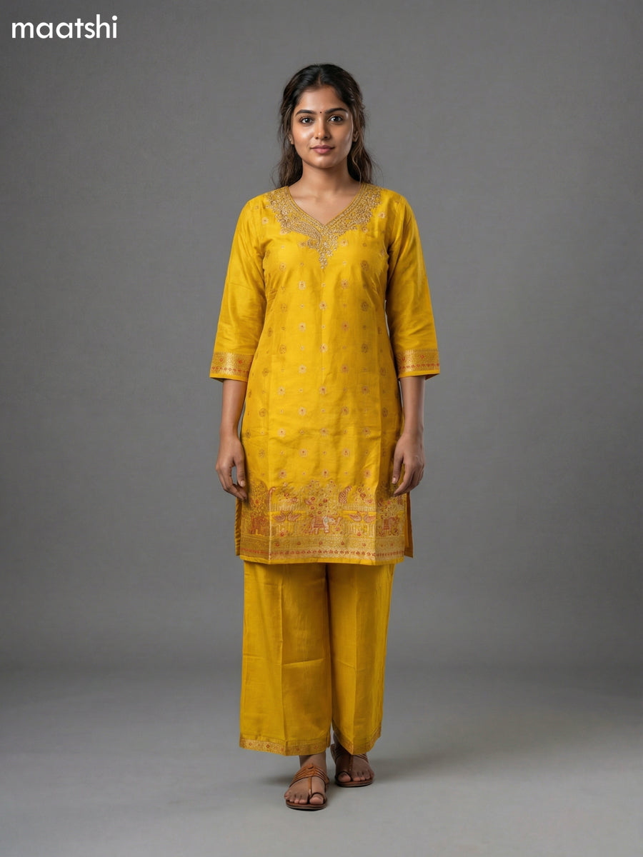 Yellow and Pink Art Tussar Zari Buttas & Sequin Work Straight Suit