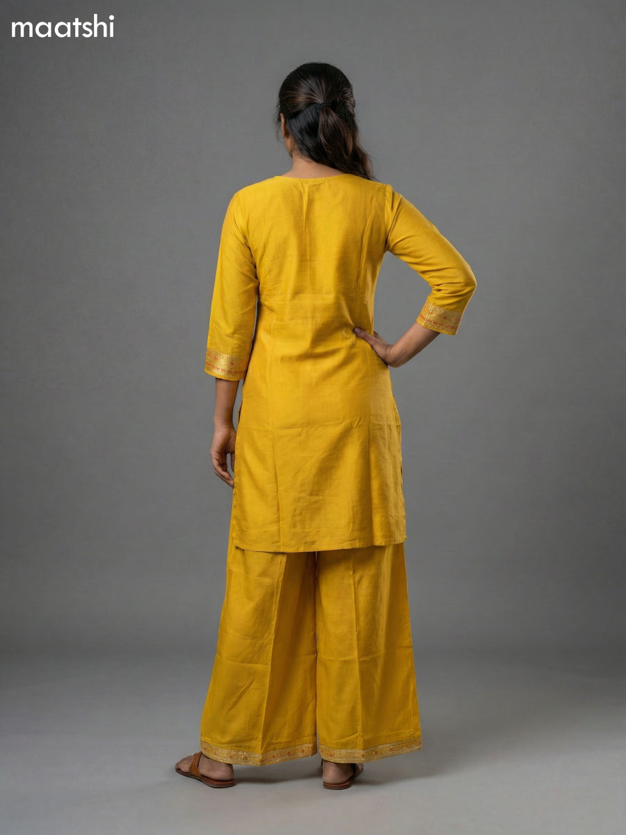 Yellow and Pink Art Tussar Zari Buttas & Sequin Work Straight Suit