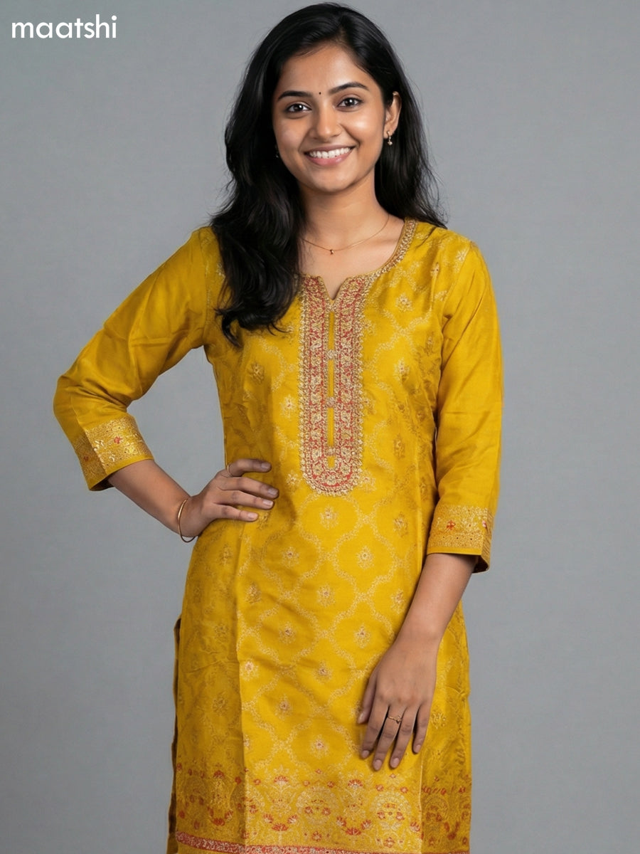 Yellow Art Tussar With Allover Zari Weaves & Sequin Work Straight Suit