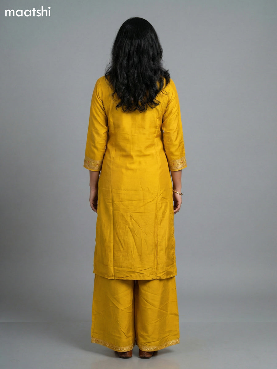 Yellow Art Tussar With Allover Zari Weaves & Sequin Work Straight Suit