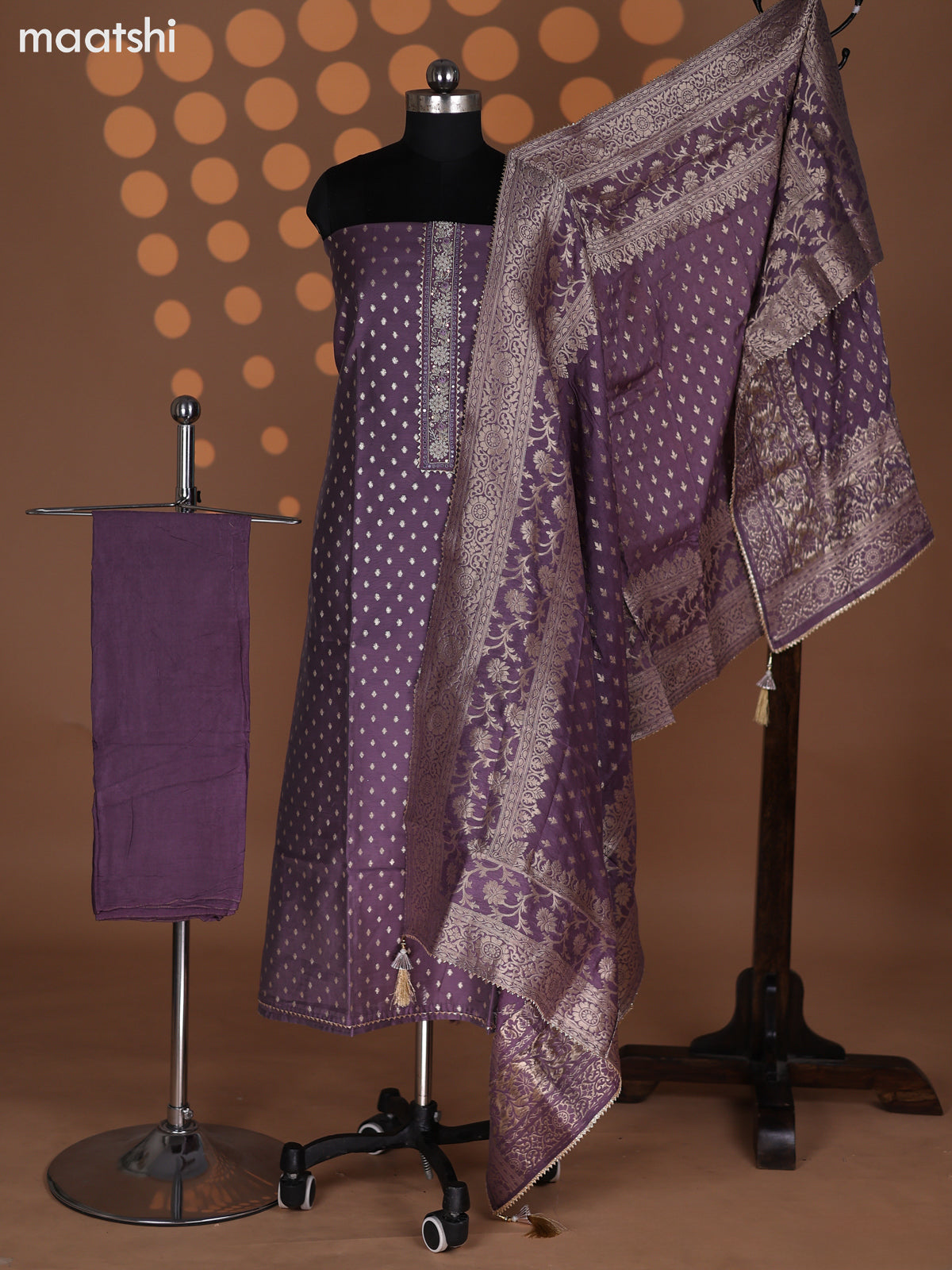 Pastel Purple Raw Silk Dress Material With Zari Buttas & Embroidery Work Neck Pattern