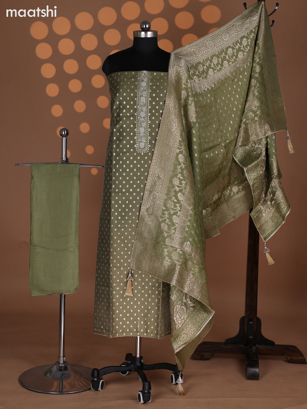 Pastel Green Raw Silk Dress Material With Zari Buttas & Embroidery Work Neck Pattern