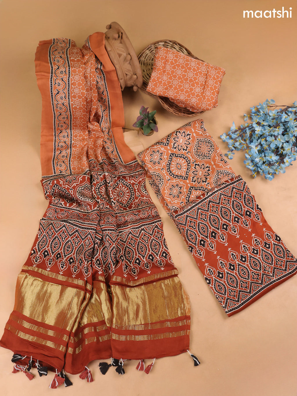 Pale Orange Modal Dress Material With Allover Ajrak Prints