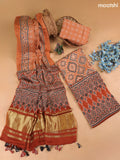Pale Orange Modal Dress Material With Allover Ajrak Prints