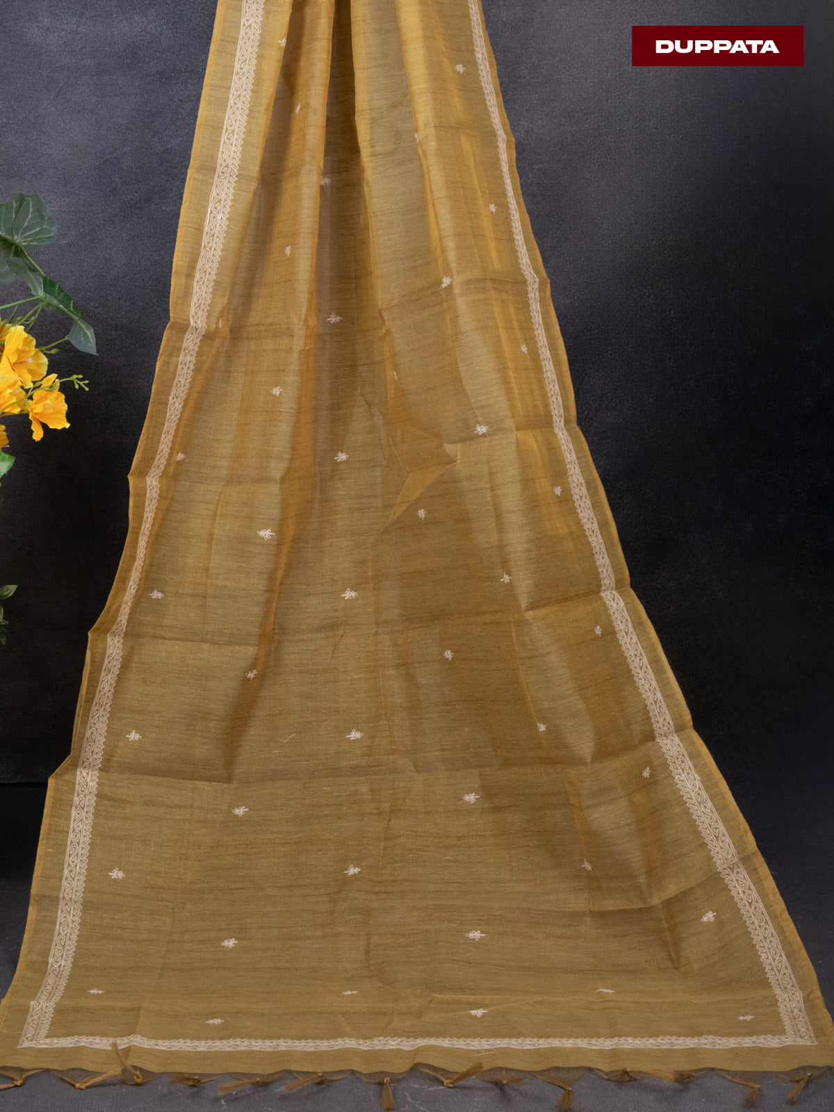 Tissue linen dress material mustard shade with floral buttas & embroidery work neck pattern and bottom & dupatta