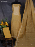 Tissue linen dress material mustard shade with floral buttas & embroidery work neck pattern and bottom & dupatta
