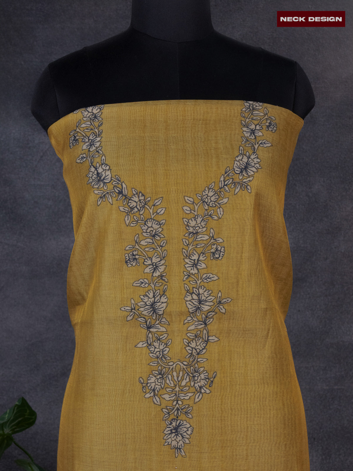 Tissue linen dress material mustard shade with floral design embroidery work neck pattern and bottom & dupatta