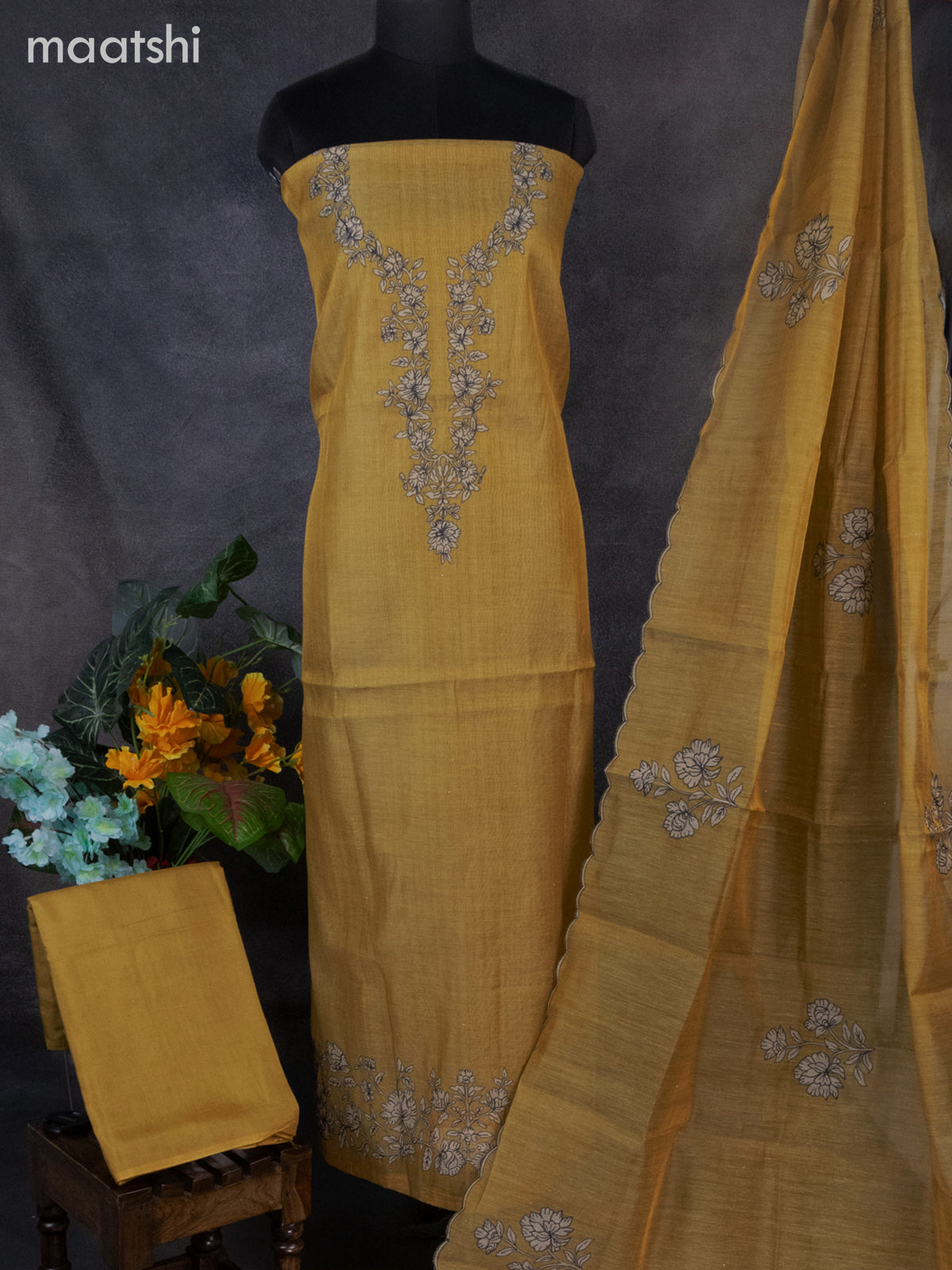 Tissue linen dress material mustard shade with floral design embroidery work neck pattern and bottom & dupatta