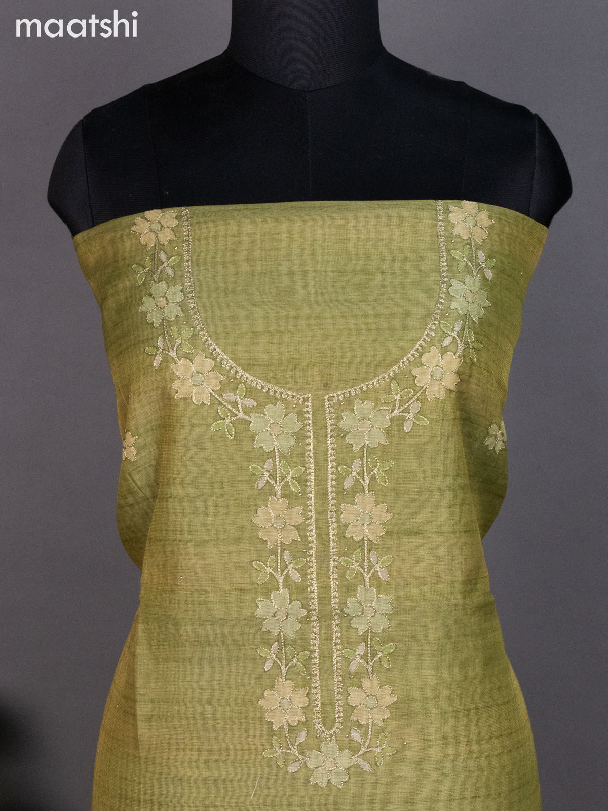 Tissue linen dress material mehendi green with floral pita work neck pattern and bottom & dupatta