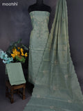 Tissue linen dress material green shade with floral buttas & embroidery work neck pattern and bottom & dupatta