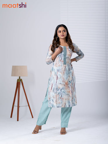 Rayon cotton readymade kurti set off white and pastel green with allover prints & embroidery mirror work neck pattern and straight cut pant