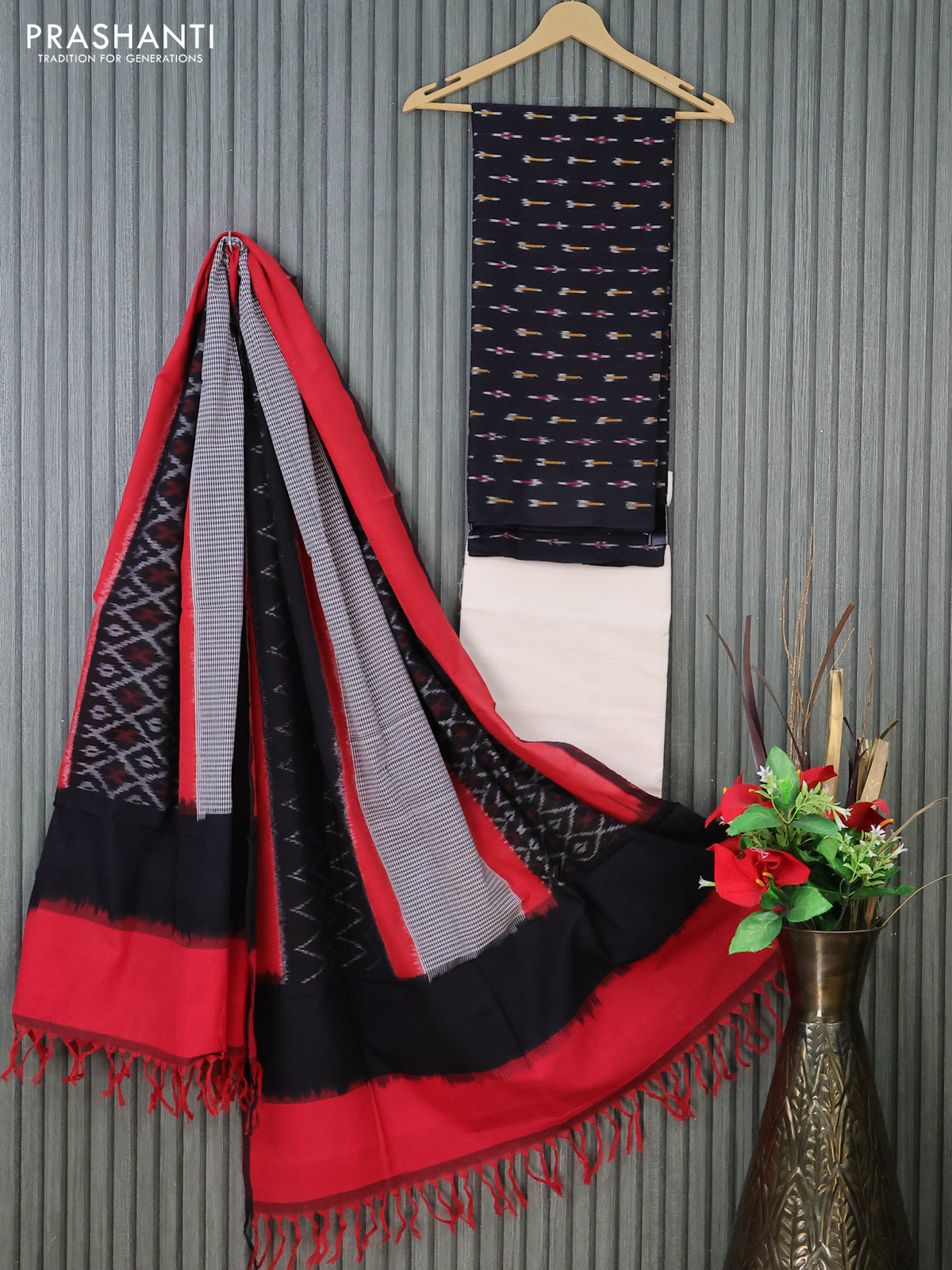 Ikat cotton dress material black and cream with allover ikat butta weaves and bottom & dupatta