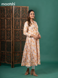Chanderi readymade anarkali kurti cream and yellow with digital prints & zari buttas simple neck pattern and without pant