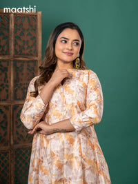 Chanderi readymade anarkali kurti cream and yellow with digital prints & zari buttas simple neck pattern and without pant