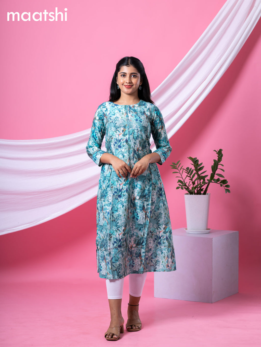 Rayon readymade A-line kurti teal blue with allover floral prints & simple neck pattern and without pant