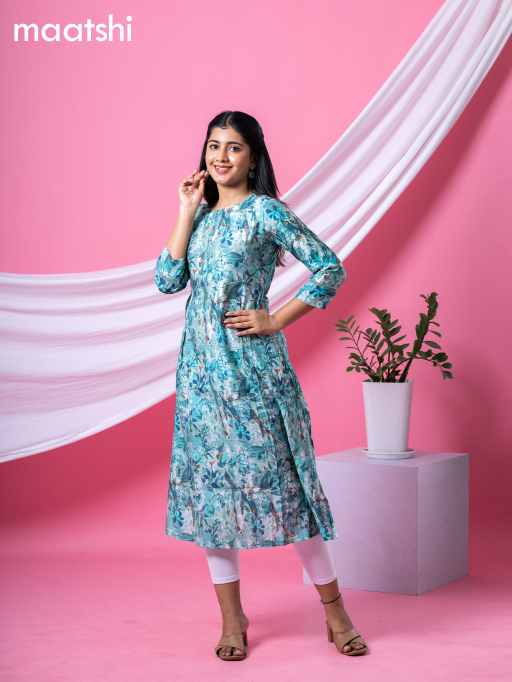 Rayon readymade A-line kurti teal blue with allover floral prints & simple neck pattern and without pant
