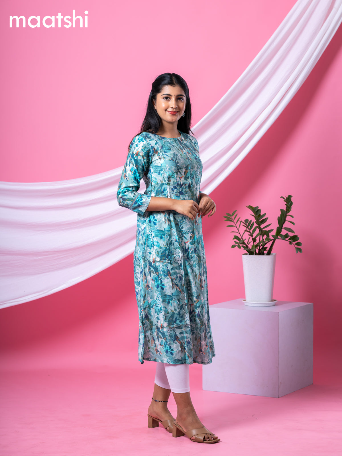 Rayon readymade A-line kurti teal blue with allover floral prints & simple neck pattern and without pant