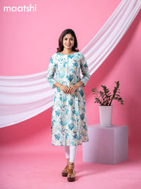 Rayon readymade A-line kurti cream and pastel green with allover floral prints & simple neck pattern and without pant