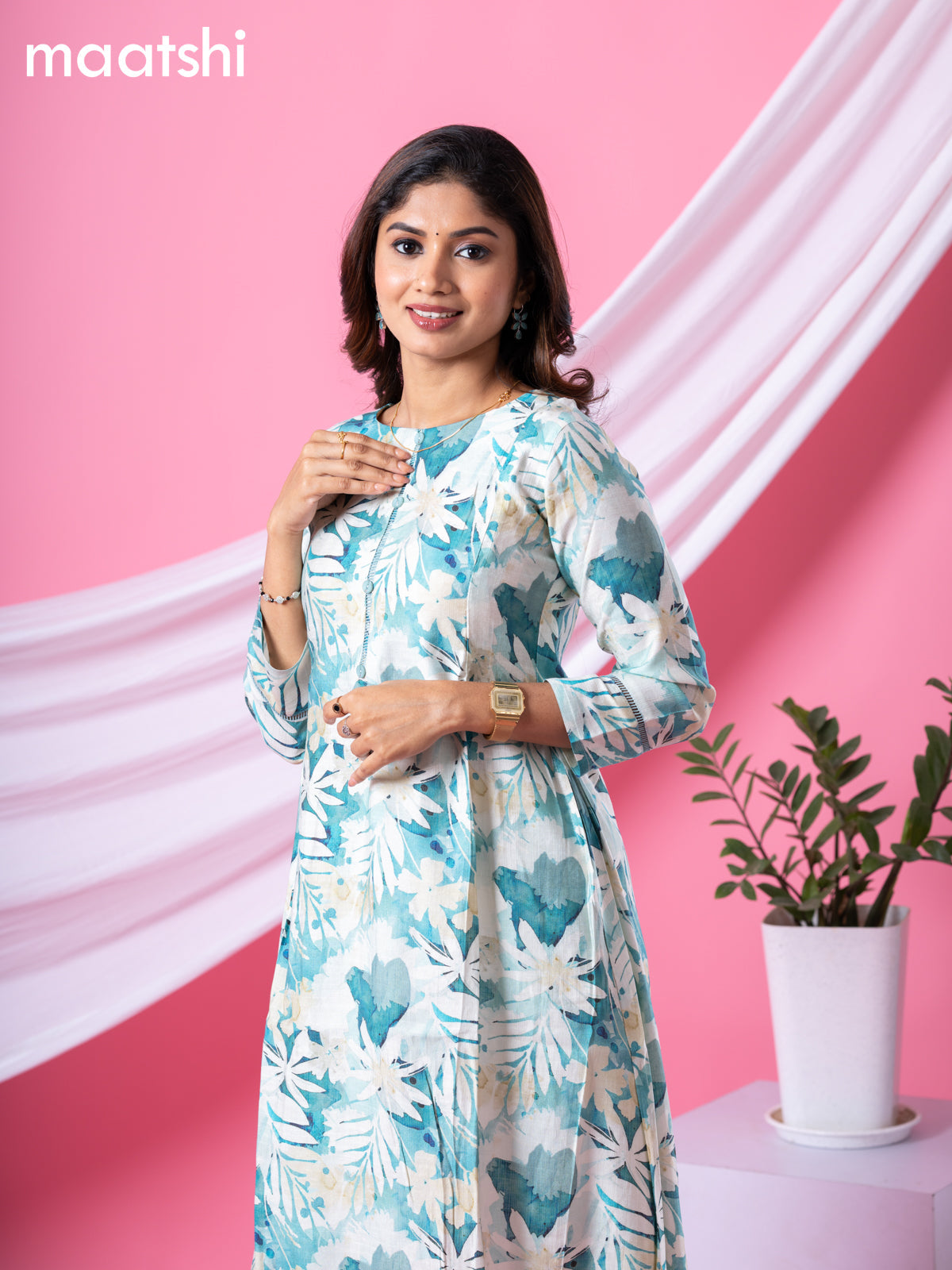 Rayon readymade A-line kurti cream and pastel green with allover floral prints & simple neck pattern and without pant