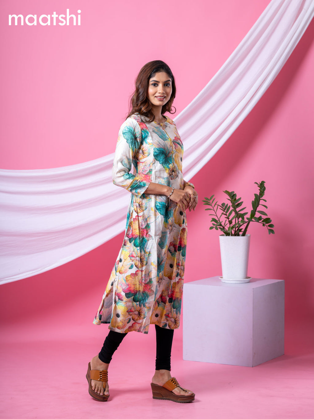Rayon readymade A-line kurti cream and multi colour with allover floral prints & simple neck pattern and without pant