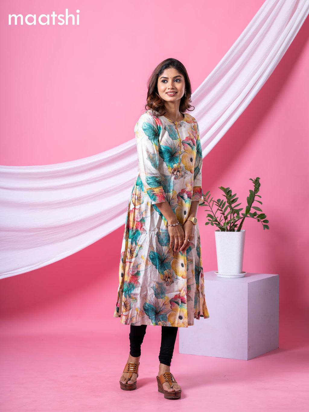 Rayon readymade A-line kurti cream and multi colour with allover floral prints & simple neck pattern and without pant