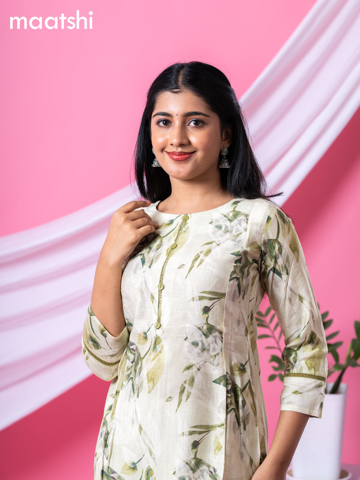 Rayon readymade A-line kurti mild pista green and sap green with allover floral prints & simple neck pattern and without pant