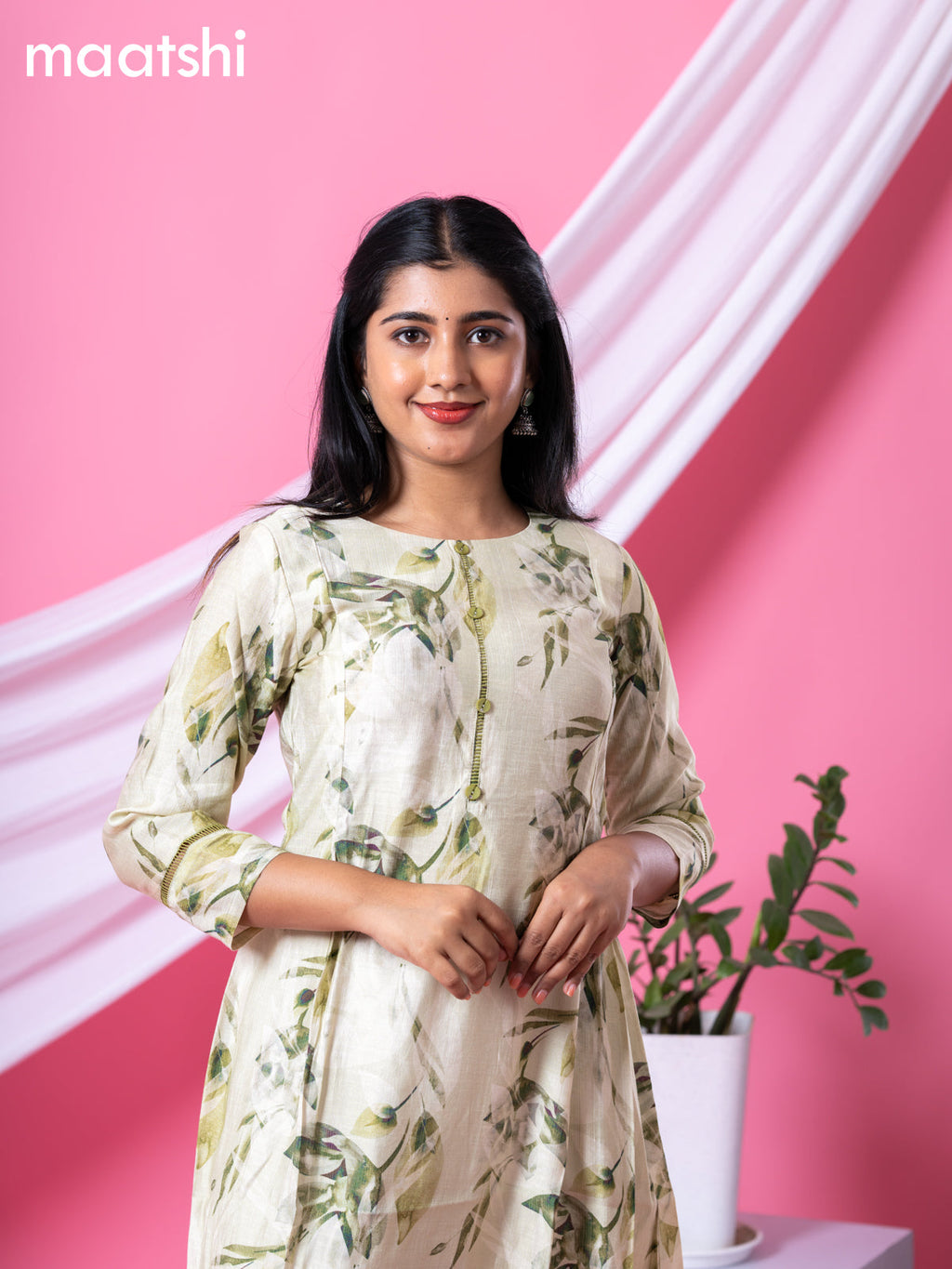 Rayon readymade A-line kurti mild pista green and sap green with allover floral prints & simple neck pattern and without pant