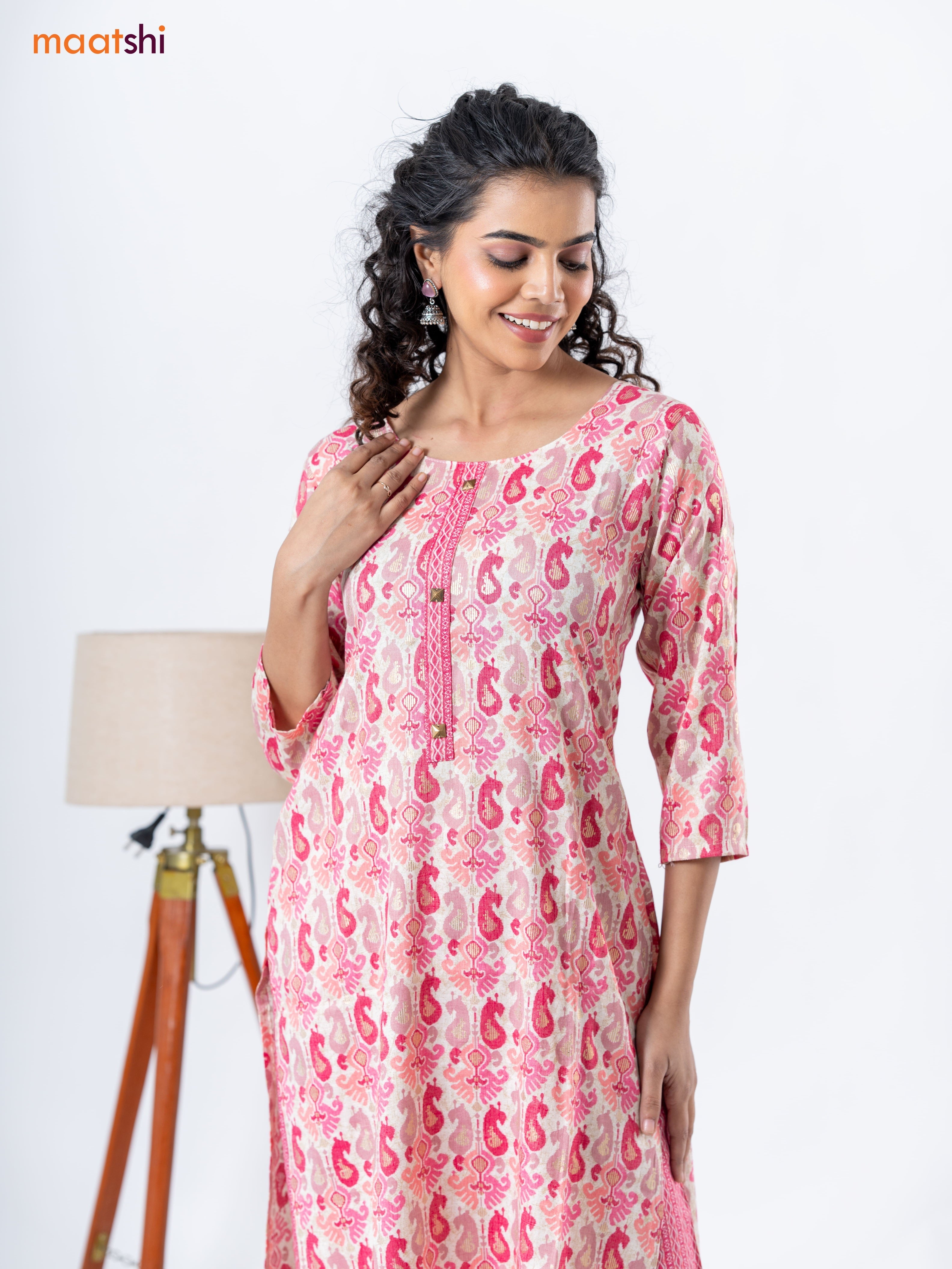Rayon kurti set cream and pink with allover ikat prints & patch work neck pattern and straight cut pant