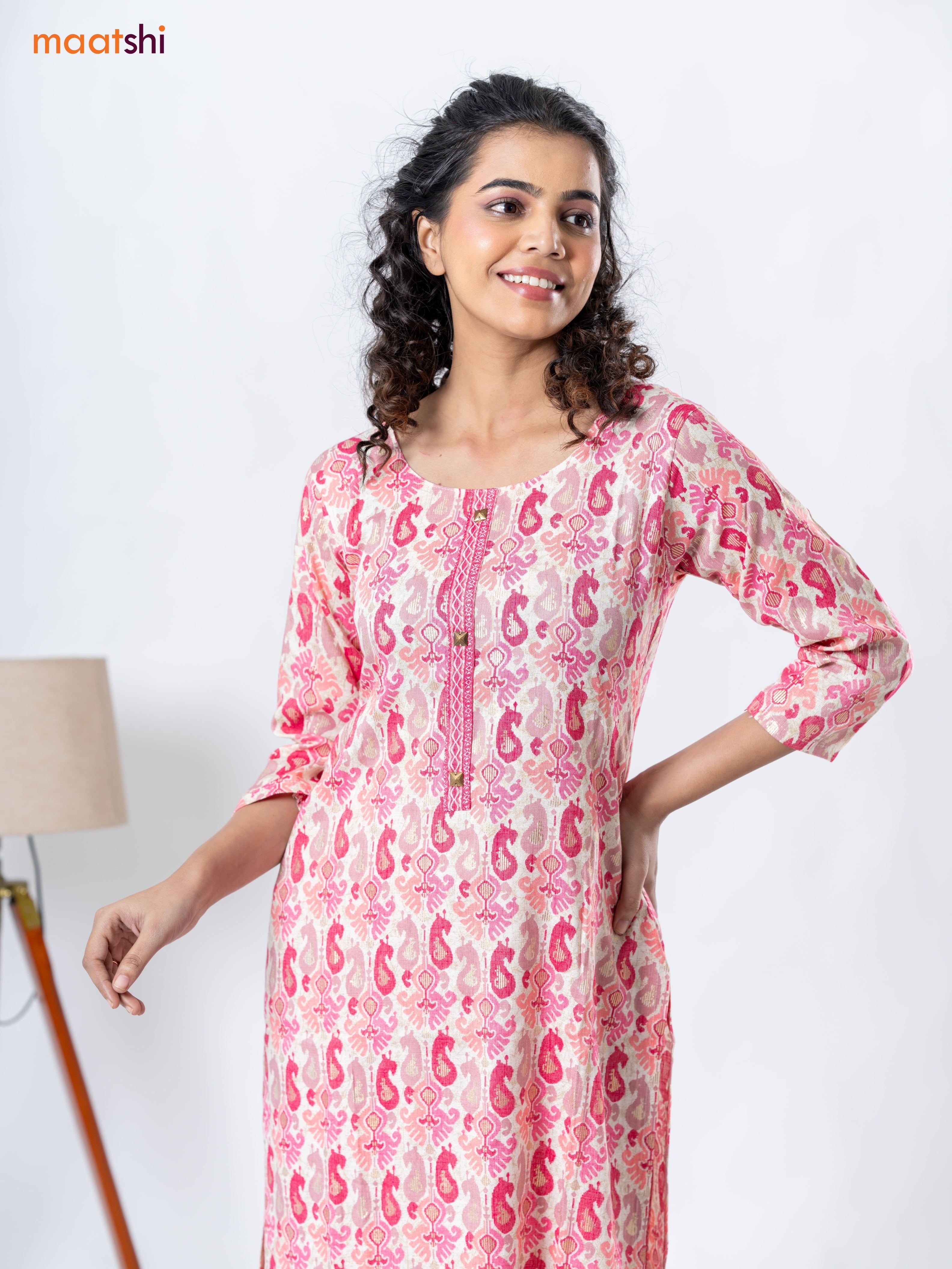 Rayon kurti set cream and pink with allover ikat prints & patch work neck pattern and straight cut pant