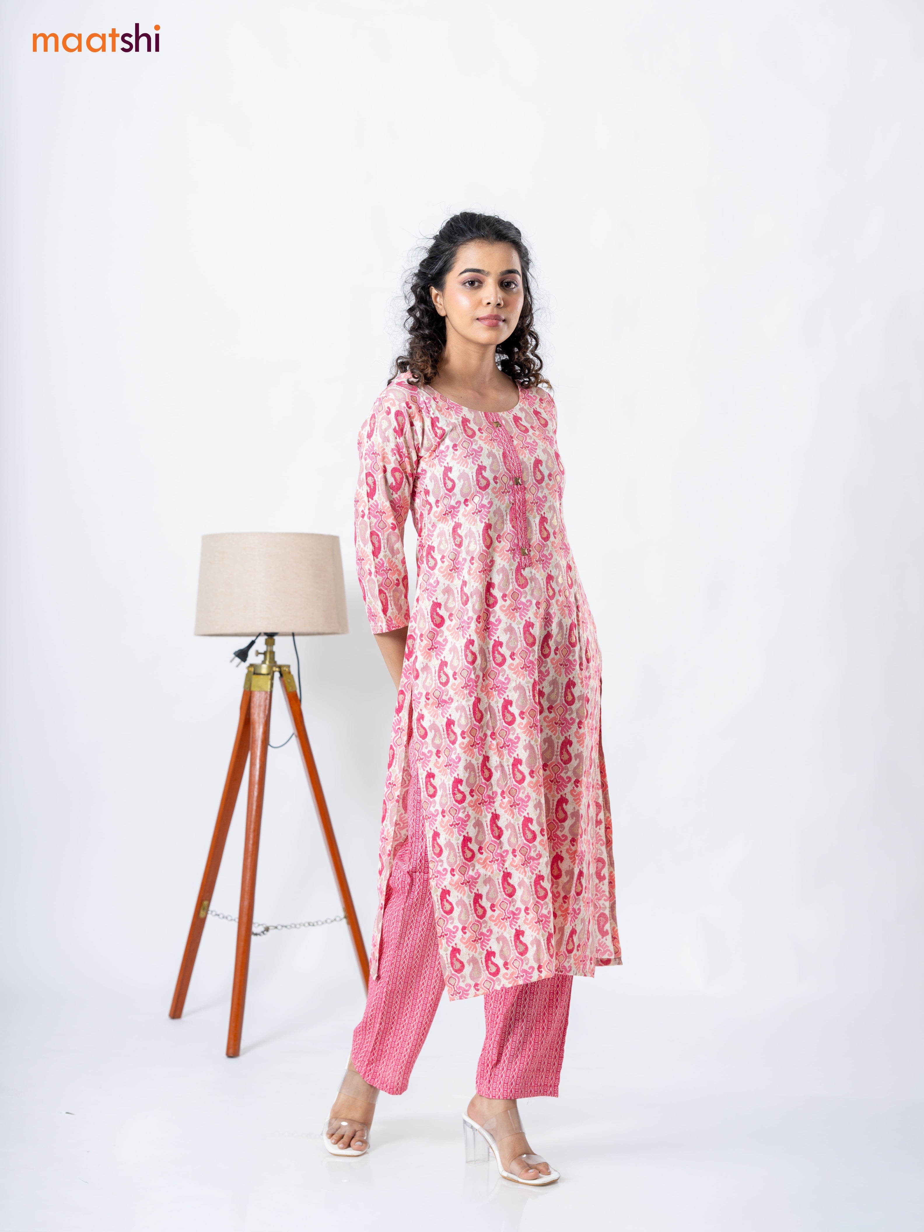 Rayon kurti set cream and pink with allover ikat prints & patch work neck pattern and straight cut pant