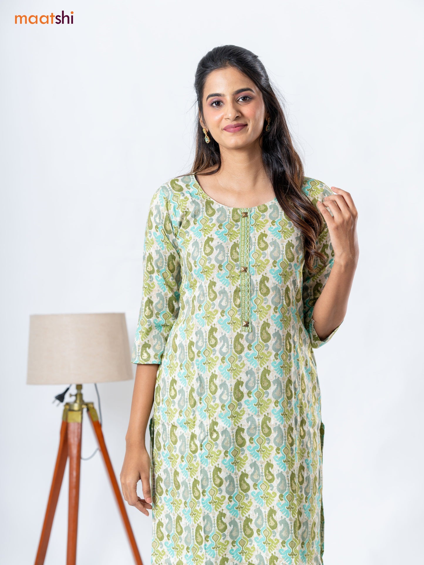 Rayon kurti set cream and mehendi green with allover ikat prints & patch work neck pattern and straight cut pant