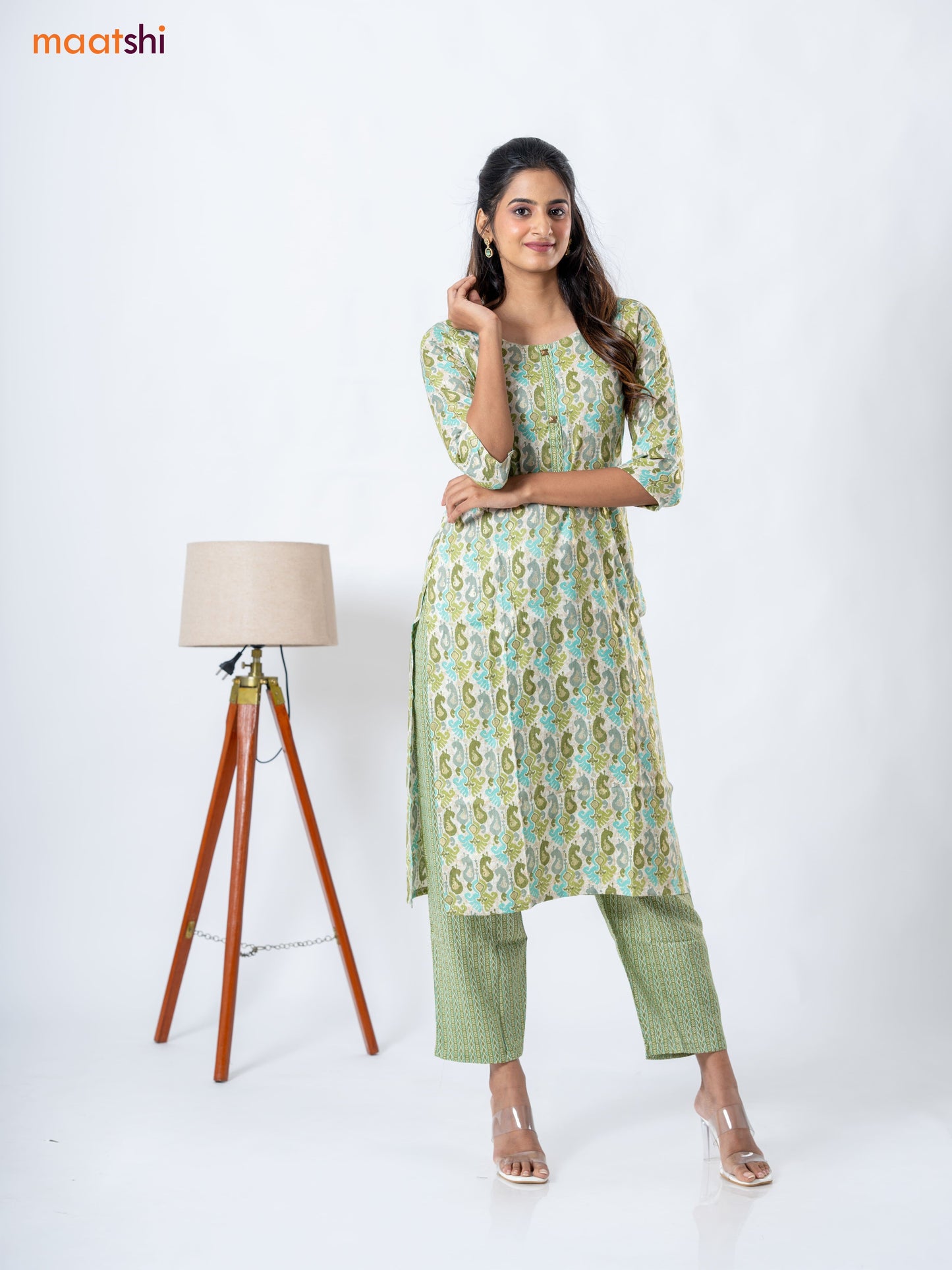 Rayon kurti set cream and mehendi green with allover ikat prints & patch work neck pattern and straight cut pant