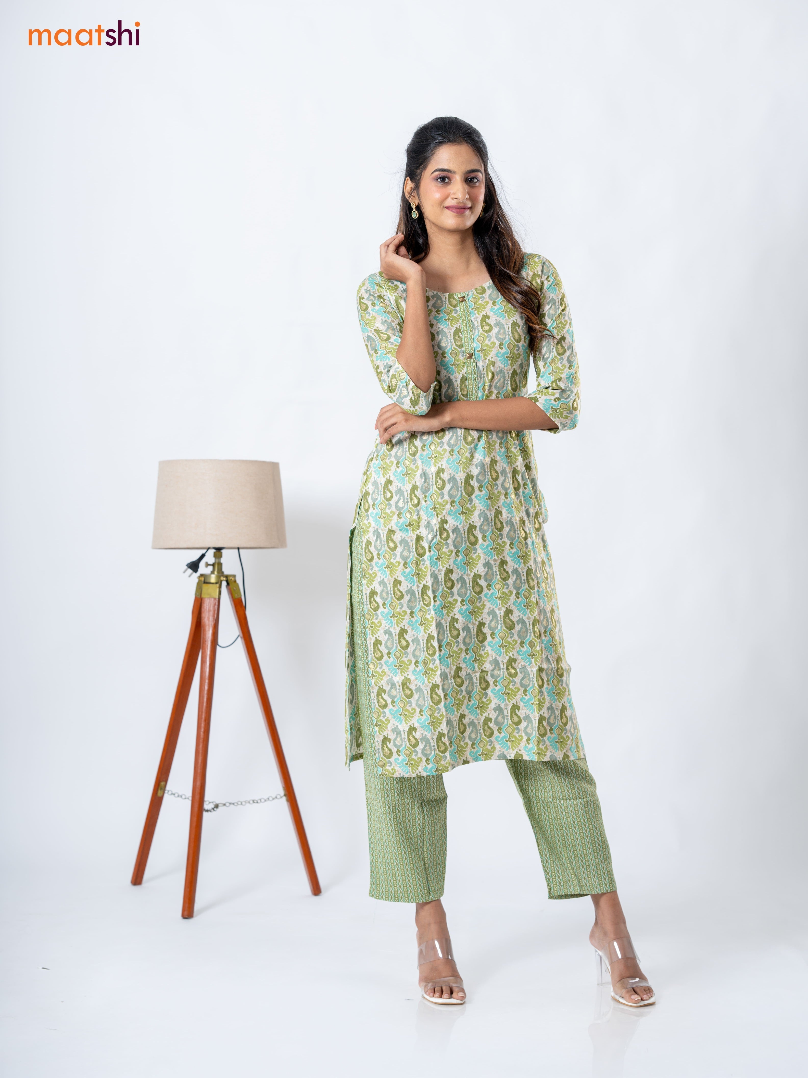 Rayon kurti set cream and mehendi green with allover ikat prints & patch work neck pattern and straight cut pant