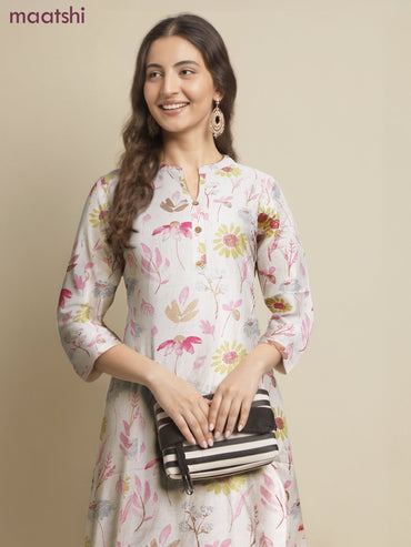 Cotton a-line kurti cream and pink shade with allover floral prints & simple neck pattern without pant