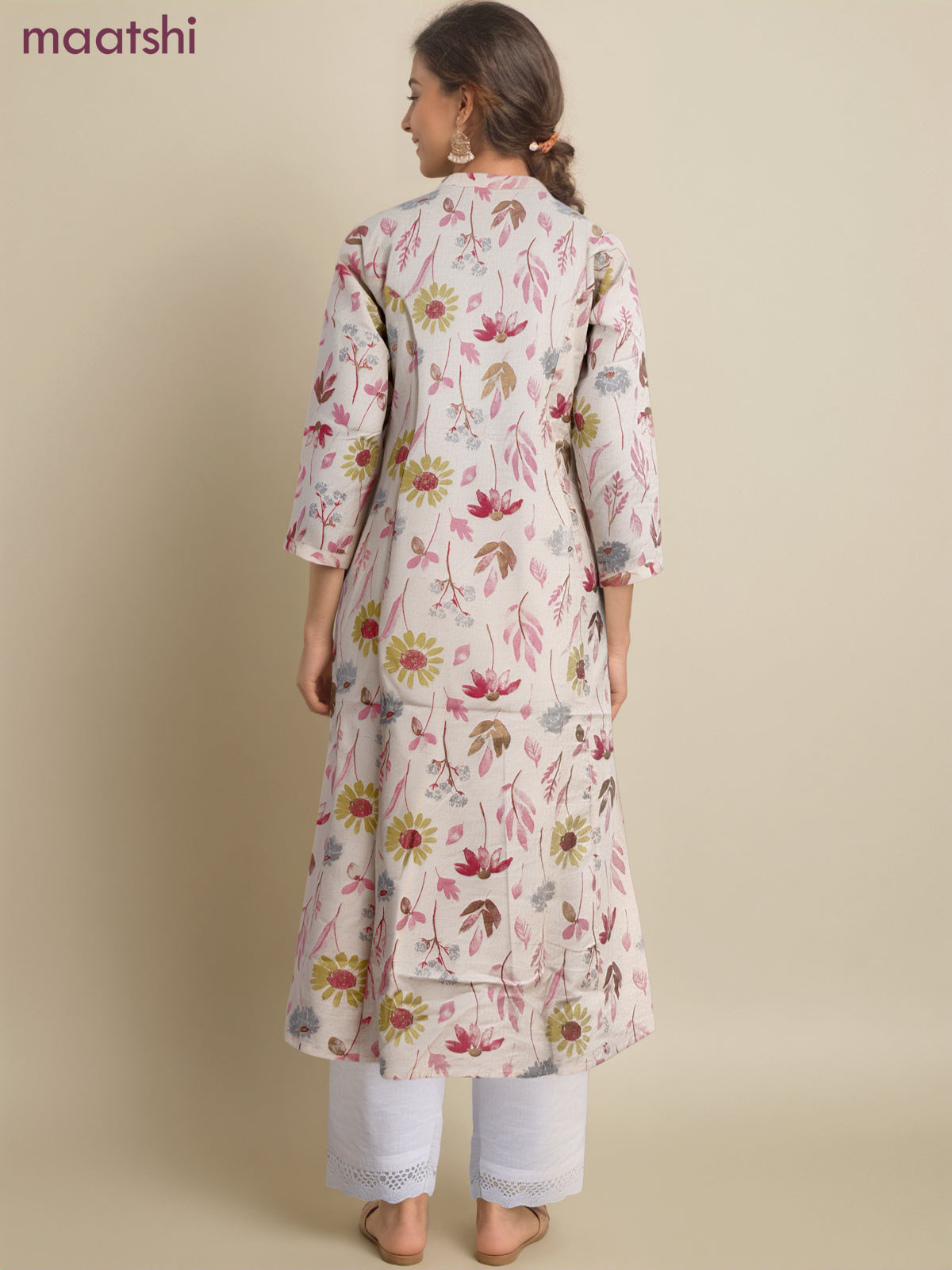 Cotton a-line kurti cream and pink shade with allover floral prints & simple neck pattern without pant